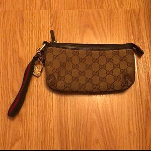 Authentic canvas Gucci wristlet